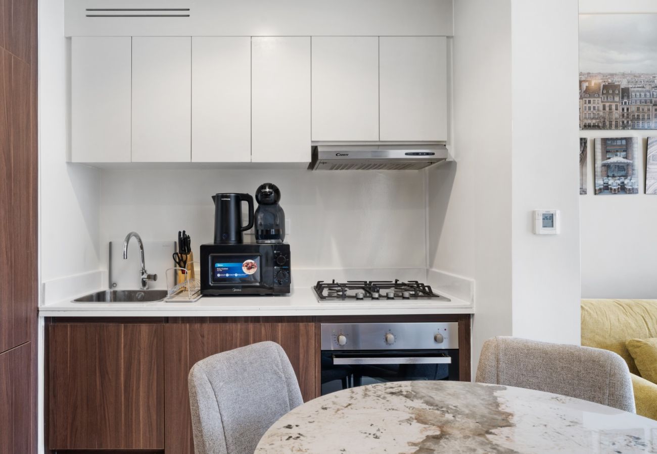 Apartment in Dubai - Charming 1BR with Sofa Bed in Reva Residence