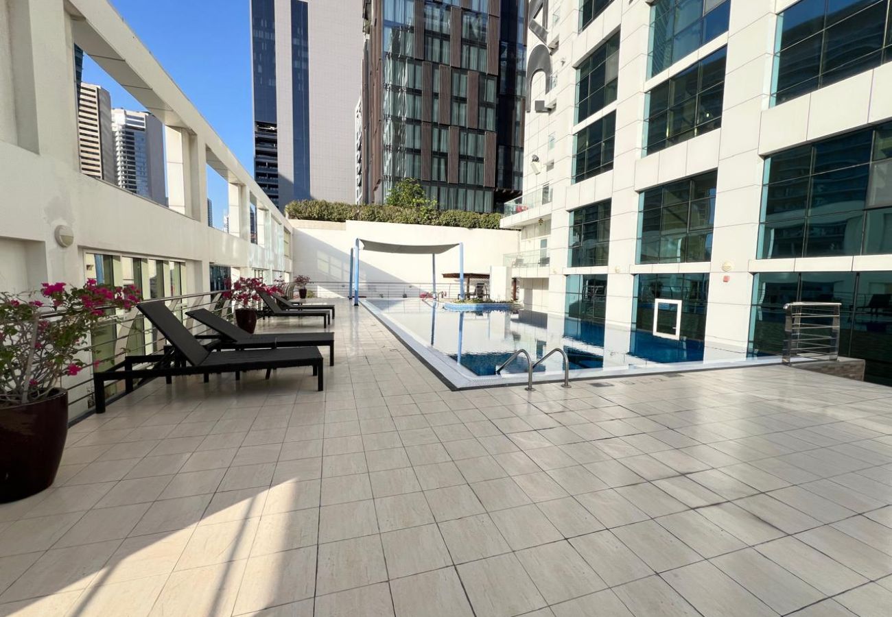 Apartment in Dubai - Luxury Prestige 1BR w/ Sofa Cum Bed-Damac Central