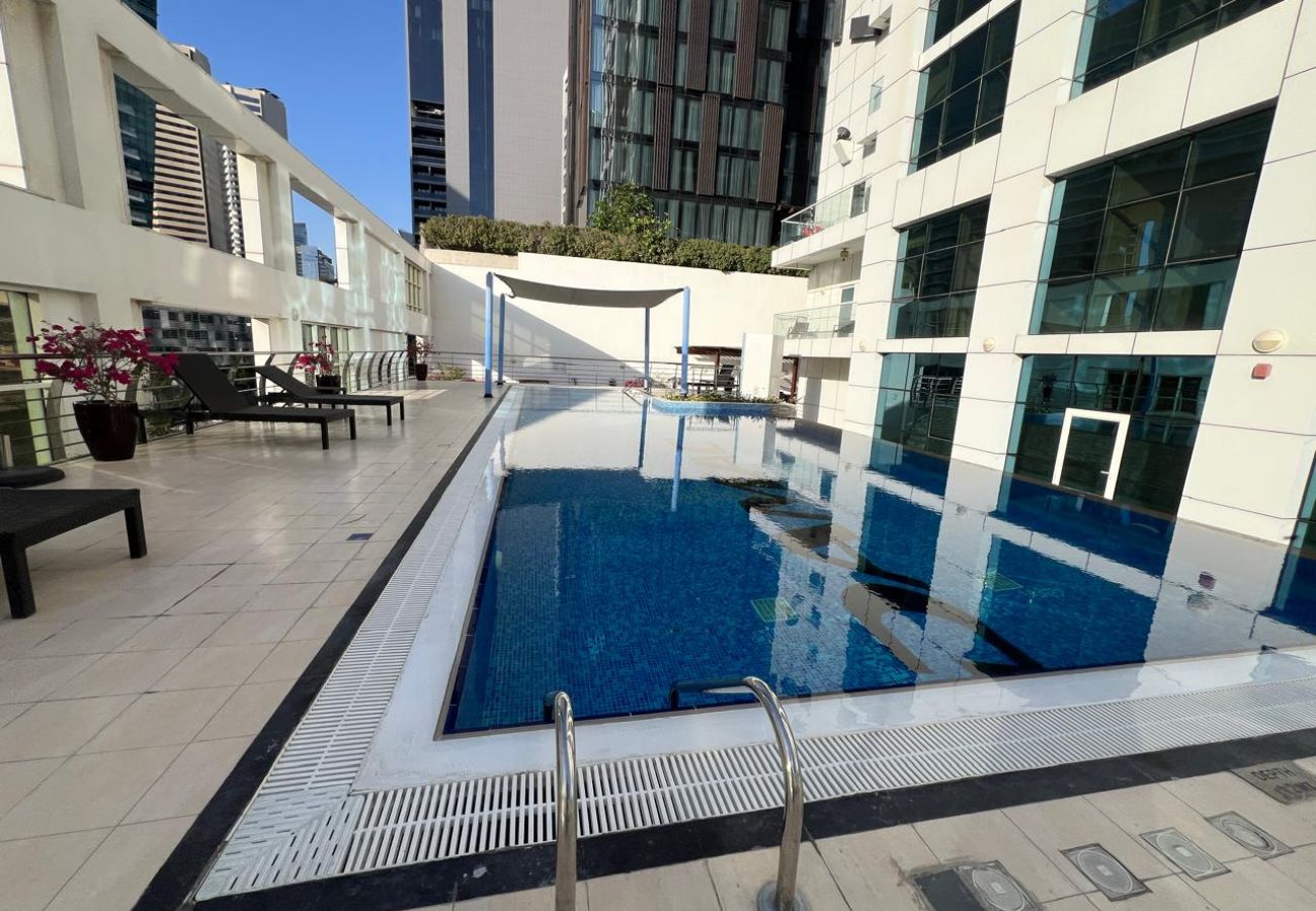 Apartment in Dubai - Luxury Prestige 1BR w/ Sofa Cum Bed-Damac Central