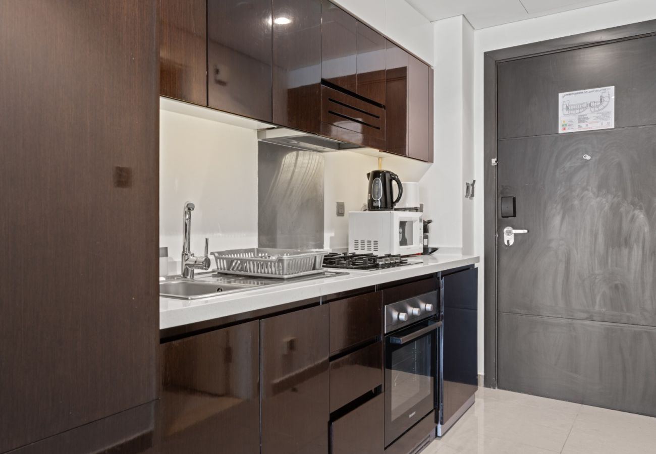 Studio in Dubai - Sunlit Studio Haven | Luxury Living in Majestine