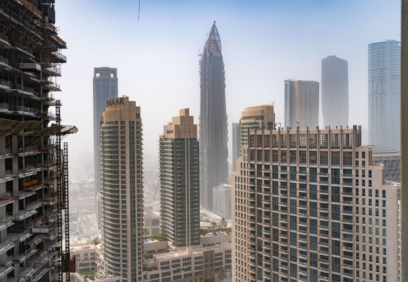 Apartment in Dubai - Grande Essence: Elegant 1BR in Downtown